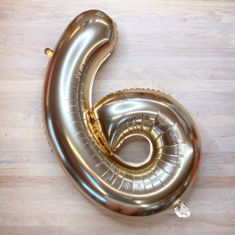 
                  
                    32" Ellie's Chrome Gold Mylar Number Balloons (1 Count) | Amazing Pinatas 
                  
                