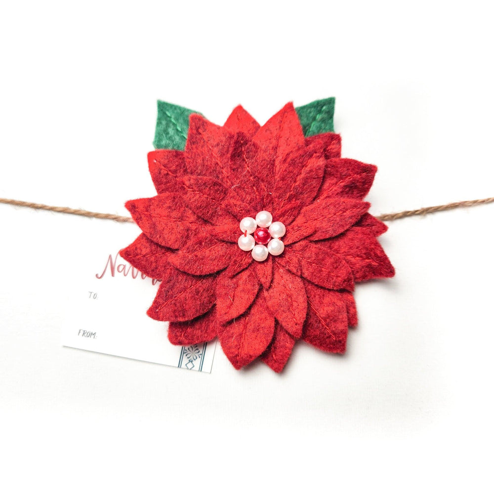 
                  
                    Reusable Poinsettia Gift Bow | Amazing Pinatas 
                  
                