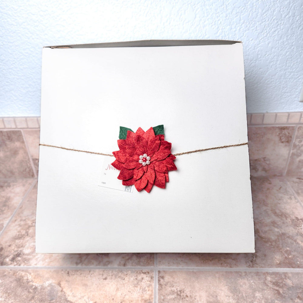 
                  
                    Reusable Poinsettia Gift Bow | Amazing Pinatas 
                  
                